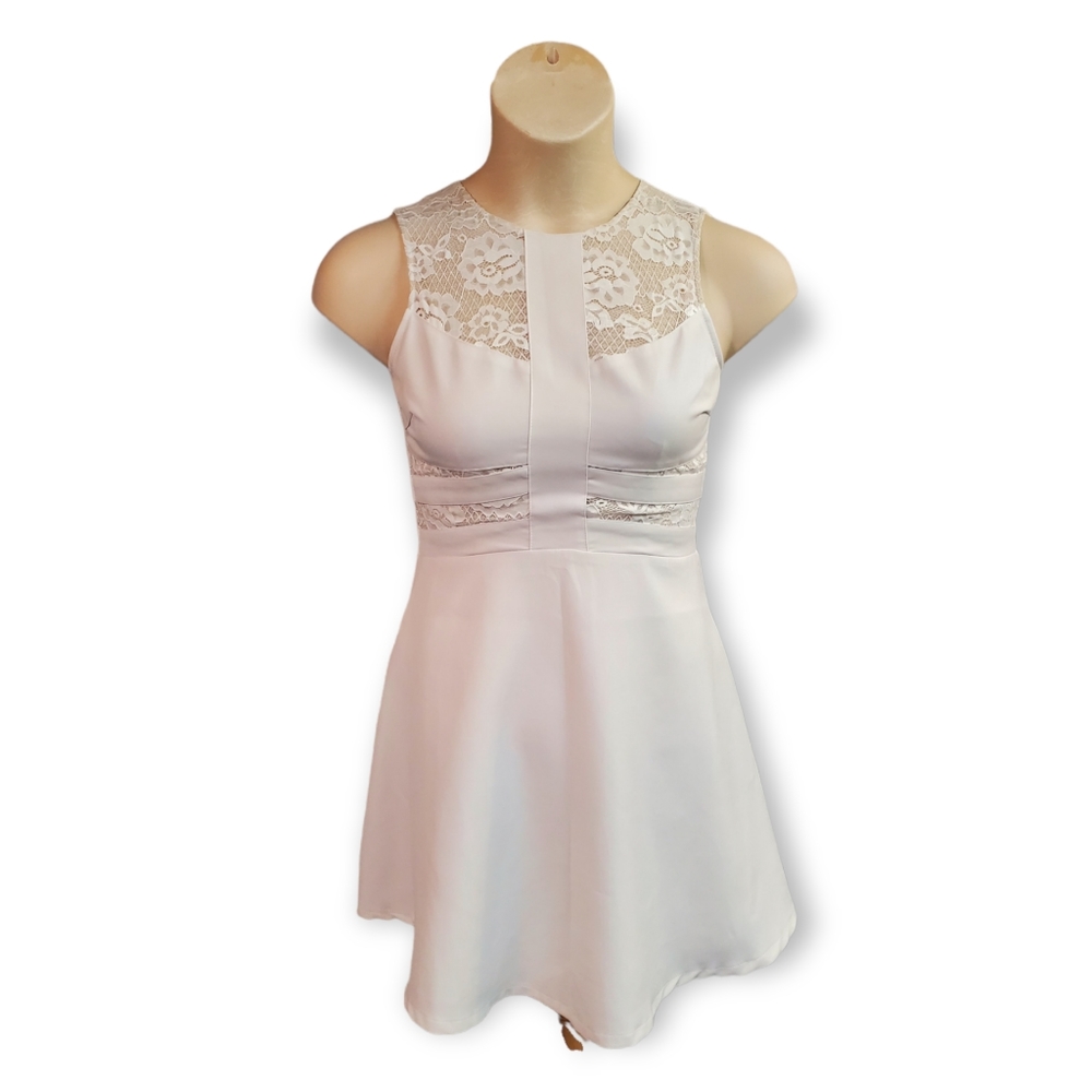 Aniina dress in white.     Buy One Get One of Equal Or Lesser Value